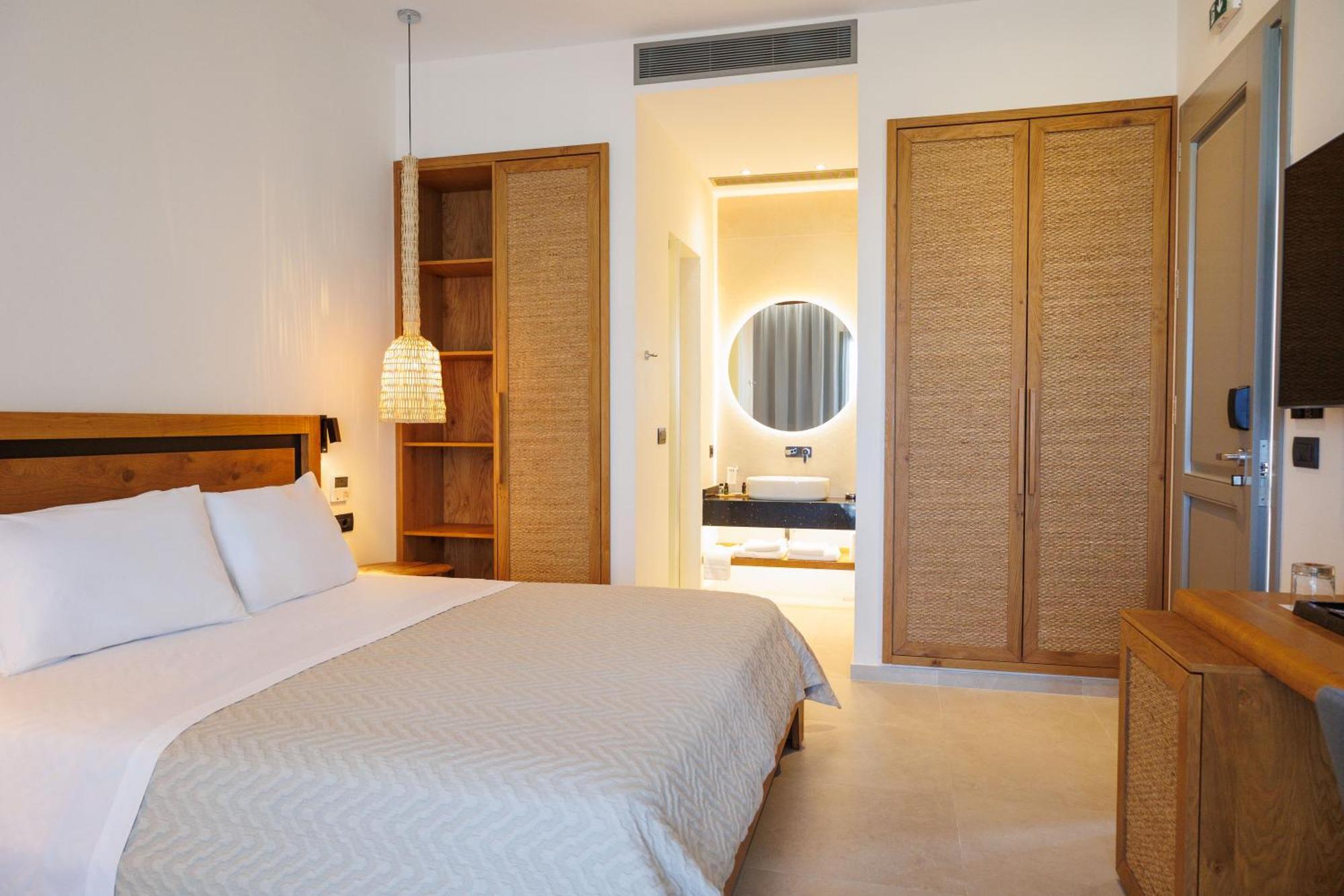 Kouros Blanc Resort & Suites Pounda Rum bild